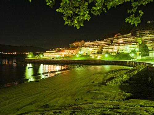 Hotel Corcubion Playa De Quenxe Exterior photo